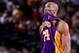 PORTLAND, OR - APRIL 10: Kobe Bryant #24 of the Los Angeles Lakers bites his jersey while playing against the Portland Trail Blazers on April 10, 2013 at the Rose Garden Arena in Portland, Oregon. NOTE TO USER: User expressly acknowledges and agrees that,