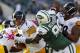 EAST RUTHERFORD, NJ - OCTOBER 13: Defensive end Muhammad Wilkerson #96 of the New York Jets fights off guard Ramon Foster #73 as he sacks quarterback Ben Roethlisberger #7 of the Pittsburgh Steelers in the fourth quarter during a game at MetLife Stadium o