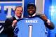 NEW YORK, NY - APRIL 25: Chance Warmack of the Alabama Crimson Tide stands on stage with NFL Commissioner Roger Goodell (L) as they hold up a jersey on stage after he was picked #10 overall by the Tennessee Titans in the first round of the 2013 NFL Draft