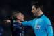 PARIS, FRANCE - APRIL 02: Marco Verratti of PSG has words with referee, Wolfgang Stark of Germany after he gives a penalty to Barcelona during the UEFA Champions League Quarter Final match between Paris Saint-Germain and Barcelona FCB at Parc des Princes