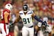 Oct 17, 2013; Phoenix, AZ, USA; Seattle Seahawks defensive end Chris Clemons (91) celebrates his first half sack against the Arizona Cardinals at University of Phoenix Stadium. Mandatory Credit: Mark J. Rebilas-USA TODAY Sports