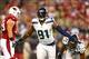 Oct 17, 2013; Phoenix, AZ, USA; Seattle Seahawks defensive end Chris Clemons (91) celebrates his first half sack against the Arizona Cardinals at University of Phoenix Stadium. Mandatory Credit: Mark J. Rebilas-USA TODAY Sports