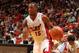 MIAMI, FL - OCTOBER 7: Mario Chalmers #15 of the Miami Heat looks to pass while driving baseline against Jeff Teague #0 of the Atlanta Hawks during a game on October 7, 2013 at American Airlines Arena in Miami, Florida. NOTE TO USER: User expressly acknow