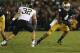 SOUTH BEND, IN - NOVEMBER 17: George Atkinson II #4 of the Notre Dame Fighting Irish moves past Scott Betros #32 of the Wake Forest Demon Deacons at Notre Dame Stadium on November 17, 2012 in South Bend, Indiana. Notre Dame defeated Wake Forest 38-0. (Ph