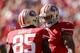 SAN FRANCISCO, CA - OCTOBER 13: Colin Kaepernick #7 congratulates Vernon Davis #85 of the San Francisco 49ers after he scored a touchdown at Candlestick Park on October 13, 2013 in San Francisco, California. (Photo by Ezra Shaw/Getty Images)
