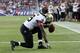FOXBORO, MA - OCTOBER 13: Running back Khiry Robinson #29 of the New Orleans Saints celebrates after scoring during the third quarter against the New England Patriots at Gillette Stadium on October 13, 2013 in Foxboro, Massachusetts. (Photo by Rob Carr/