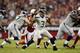 GLENDALE, AZ - OCTOBER 17: Quarterback Russell Wilson #3 of the Seattle Seahawks passes against the Arizona Cardinals during a game at the University of Phoenix Stadium on October 17, 2013 in Glendale, Arizona. (Photo by Christian Petersen/Getty Images)