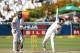 CAPE TOWN, SOUTH AFRICA - FEBRUARY 17: Hashim Amla of South Africa backs up as Saeed Ajmal of Pakistan sends down a delivery during day 4 of the 2nd Sunfoil Test match between South Africa and Pakistan at Sahara Park Newlands on February 17, 2013 in Cape