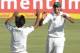 PRETORIA, SOUTH AFRICA - FEBRUARY 22: Mohammad Irfan and Rahat Ali of Pakistan celebrate the run out of Robin Peterson during the day 1 of the 3rd Test match between South Africa and Pakistan at SuperSport Park on February 22, 2013 in Pretoria, South Afr