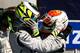 MONZA, ITALY - SEPTEMBER 13: Race winner Rubens Barrichello (R) of Brazil and Brawn GP celebrates with second placed team mate Jenson Button (L) of Great Britain and Brawn GP in parc ferme following the Italian Formula One Grand Prix at the Autodromo Naz