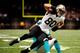NEW ORLEANS, LA - SEPTEMBER 30: Jimmy Graham #80 of the New Orleans Saints scores a touchdown over Chris Clemons #30 of the Miami Dolphins during a game at the Mercedes-Benz Superdome on September 30, 2013 in New Orleans, Louisiana. The Saints won the g