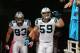 GLENDALE, AZ - OCTOBER 06: Middle linebacker Luke Kuechly #59 of the Carolina Panthers leads outside linebacker Chase Blackburn #93 out onto the field before the NFL game against the Arizona Cardinals at the University of Phoenix Stadium on October 6, 20