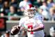 Oct 12, 2013; East Lansing, MI, USA; Indiana Hoosiers quarterback Nate Sudfeld (7) drops back to pass against the Michigan State Spartans defense during the second half in a game at Spartan Stadium. MSU won 42-28. Mandatory Credit: Mike Carter-USA TODAY S