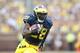 ANN ARBOR, MI - OCTOBER 05: Fitzgerald Toussaint #28 of the Michigan Wolverines runs eight yards for a first quarter touchdown during the game against the Minnesota Golden Gophers at Michigan Stadium on October 5, 2013 in Ann Arbor, Michigan. (Photo by L