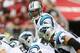 GLENDALE, AZ - OCTOBER 06: Quarterback Cam Newton #1 of the Carolina Panthers prepares to hike the football during the NFL game against the Arizona Cardinals at the University of Phoenix Stadium on October 6, 2013 in Glendale, Arizona. The Cardinals defe