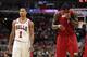 CHICAGO, IL - MAY 26: (L-R) Derrick Rose #1 of the Chicago Bulls looks on as LeBron James #6 of the Miami Heat wipes his face with his jersey in Game Five of the Eastern Conference Finals during the 2011 NBA Playoffs on May 26, 2011 at the United Center i
