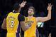 Apr 17, 2013; Los Angeles, CA, USA; Los Angeles Lakers forward Pau Gasol (16) and center Dwight Howard (12) celebrate during the game against the Houston Rockets at the Staples Center. The Lakers defeated the Rockets 99-95 in overtime. Mandatory Credit: K