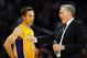 Oct 6, 2013; Los Angeles, CA, USA; Los Angeles Lakers head coach Mike D'Antoni talks with guard Steve Nash (10) during the first half against the Denver Nuggets at Staples Center. Mandatory Credit: Christopher Hanewinckel-USA TODAY Sports