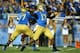 PASADENA, CA - SEPTEMBER 21: Quarterback Brett Hundley #17 the UCLA Bruins throws a pass against the New Mexico State Aggies at the Rose Bowl on September 21, 2013 in Pasadena, California. (Photo by Stephen Dunn/Getty Images)