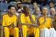 Oct 8, 2013; Ontario, CA, USA; Los Angeles Lakers guards Jordan Farmar (left), Kobe Bryant (center) and Steve Blake react during the game against the Denver Nuggets at Citizens Business Bank Arena. Mandatory Credit: Kirby Lee-USA TODAY Sports