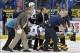 Oct 15, 2013; St. Louis, MO, USA; San Jose Sharks defenseman Dan Boyle (22) is taken off the ice after being injured during the first period against the St. Louis Blues at Scottrade Center. Mandatory Credit: Jasen Vinlove-USA TODAY Sports
