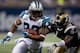 ST. LOUIS, MO - SEPTEMBER 9: Steve Smith #89 of the Carolina Panthers looks to get away from Tye Hill #26 of the St. Louis Rams on September 9, 2007 at the Edward Jones Dome in St. Louis, Missouri. The Panthers beat the Rams 27-13. (Photo by Dilip Vishw