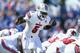 LEXINGTON, KY - SEPTEMBER 14: Teddy Bridgewater #5 of the Louisville Cardinals gives instructions to his team during the game against the Kentucky Wildcats at Commonwealth Stadium on September 14, 2013 in Lexington, Kentucky. (Photo by Andy Lyons/Getty