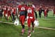 LOUISVILLE, KY - OCTOBER 18: Lorenzo Mauldin #94 and Keith Towbridge #89 of the Louisville Cardinals walk off of the field after the Cardinals 38-35 loss to the Central Florida Knights at Papa John's Cardinal Stadium on October 18, 2013 in Louisville, Ke