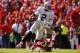 KANSAS CITY, MO - OCTOBER 13: Terrelle Pryor #2 of the Oakland Raiders rushes against Justin Houston #50 of the Kansas City Chiefs in the second quarter October 13, 2013 at Arrowhead Stadium in Kansas City, Missouri. (Photo by Kyle Rivas/Getty Images)