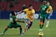 BEIJING, CHINA - OCTOBER 15: Hulk of Brazil (C) competes the ball with Mboi A Emmanuel (L) of Zambia during the international friendly match between Brazil and Zambia at Beijing National Stadium on October 15, 2013 in Beijing, China. (Photo by Lintao Zha
