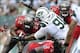 Sep 8, 2013; East Rutherford, NJ, USA; New York Jets defensive tackle Sheldon Richardson (91) tackles Tampa Bay Buccaneers running back Doug Martin (22) during the first half at MetLife Stadium. The Jets won 18-17. Mandatory Credit: Joe Camporeale-USA TOD