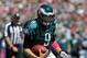 TAMPA, FL - OCTOBER 13: Quarterback Nick Foles #9 of the Philadelphia Eagles runs upfield against the Tampa Bay Buccaneers October 13, 2013 at Raymond James Stadium in Tampa, Florida. The Eagles won 31 - 20. (Photo by Al Messerschmidt/Getty Images)