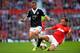 MANCHESTER, ENGLAND - OCTOBER 19: Daniel Osvaldo of Southampton is tackled by Jonny Evans of Manchester United during the Barclays Premier League match between Manchester United and Southampton at Old Trafford on October 19, 2013 in Manchester, England.