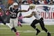 Oct 13, 2013; Foxborough, MA, USA; New England Patriots running back Stevan Ridley (22) stiff arms New Orleans Saints safety Kenny Vaccaro (32) during the second quarter at Gillette Stadium. The Patriots defeated the Saints 30-27. Mandatory Credit: Stew M