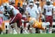 Oct 19, 2013; Knoxville, TN, USA; Tennessee Volunteers defensive back Justin Coleman (27) misses a tackle against South Carolina Gamecocks running back Mike Davis (28) during the second quarter at Neyland Stadium. Mandatory Credit: Randy Sartin-USA TODAY