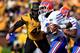 COLUMBIA, MO - OCTOBER 19: Quarterback Tyler Murphy #3 of the Florida Gators is hit by defensive lineman Kony Ealy #47 of the Missouri Tigers during the game at Faurot Field/Memorial Stadium on October 19, 2013 in Columbia, Missouri. (Photo by Jamie Squ