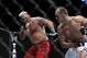 May 25, 2013; Las Vegas, NV, USA; Mark Hunt reacts after Junior dos Santos lands a punch during UFC 160 at the MGM Grand Garden Arena. Mandatory Credit: Gary A. Vasquez-USA TODAY Sports
