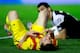 PAMPLONA, SPAIN - OCTOBER 19: Lionel Messi of FC Barcelona lies on the ground defeated after failing to score ahead goalkeeper Andres Fernandez Moreno of CA Osasuna during the La Liga match between CA Osasuna and FC Barcelona at El Sadar stadium on Octobe