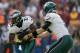 WASHINGTON, DC - NOVEMBER 18: Quarterback Nick Foles #9 of the Philadelphia Eagles hands the ball off to running back LeSean McCoy #25 during the first half against the Washington Redskins at FedEx Field on November 18, 2012 in Washington, DC. (Photo by