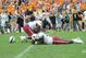 Oct 19, 2013; Knoxville, TN, USA; South Carolina Gamecocks defensive tackle Gerald Dixon Jr. (92) reacts on the field with a teammate after the game against the Tennessee Volunteers at Neyland Stadium. Tennessee won 23 to 21. Mandatory Credit: Randy Sart