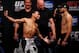 Oct 18, 2013; Houston, TX, USA; John Dodson, left, and Darrell Montague, right, during the weigh-in for UFC 166 at Toyota Center. Mandatory Credit: Andrew Richardson-USA TODAY Sports