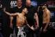 Oct 18, 2013; Houston, TX, USA; John Dodson, left, and Darrell Montague, right, during the weigh-in for UFC 166 at Toyota Center. Mandatory Credit: Andrew Richardson-USA TODAY Sports