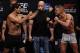 Oct 18, 2013; Houston, TX, USA; Gilbert Melendez, left, and Diego Sanchez, right, during the weigh-in for UFC 166 at Toyota Center. Mandatory Credit: Andrew Richardson-USA TODAY Sports