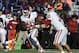 Oct 19, 2013; Lawrence, KS, USA; Oklahoma Sooners quarterback Blake Bell (10) hands off to running back Roy Finch (22) against the Kansas Jayhawks in the second half at Memorial Stadium. Oklahoma won the game 34-19. Mandatory Credit: John Rieger-USA TODAY