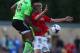 NAILSWORTH, ENGLAND - JULY 24: Jamie Turley (L) of Forest Green challenges Andreas Cornelius (R) of Cardiff City during the Pre Season Friendly match between Forest Green and Cardiff City at New Lawn Stadium on July 24, 2013 in Nailsworth, England. (Pho