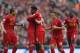 LIVERPOOL, ENGLAND - AUGUST 17: Daniel Sturridge of Liverpool is congratulated by Iago Aspas,Lucas,Philuppe Coutinho and Kolo Toure after scoring the first goal during the Barclays Premier League match between Liverpool and Stoke City at Anfield on Augus