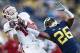 Oct 19, 2013; Ann Arbor, MI, USA; Indiana Hoosiers wide receiver Nick Stoner (14) makes a catch over Michigan Wolverines defensive back Jourdan Lewis (26) in the second half at Michigan Stadium. Michigan won 63-47. Mandatory Credit: Rick Osentoski-USA TOD