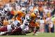 KNOXVILLE, TN - OCTOBER 19: Marlin Lane #15 of the Tennessee Volunteers runs with the ball against the South Carolina Gamecocks during the game at Neyland Stadium on October 19, 2013 in Knoxville, Tennessee. Tennessee won 23-21. (Photo by Joe Robbins/Gett