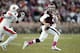 HOUSTON, TX - OCTOBER 19: Johnny Manziel #2 of the Texas A&M Aggies scrambles from Kris Frost #17 of the Auburn Tigers on October 19, 2013 at Kyle Field in College Station, Texas. Auburn Tigers won 45 to 41.(Photo by Thomas B. Shea/Getty Images)