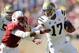 PALO ALTO, CA - OCTOBER 19: Brett Hundley #17 of the UCLA Bruins tries to straight-arm Jordan Richards #8 of the Stanford Cardinal at Stanford Stadium on October 19, 2013 in Palo Alto, California. (Photo by Ezra Shaw/Getty Images)